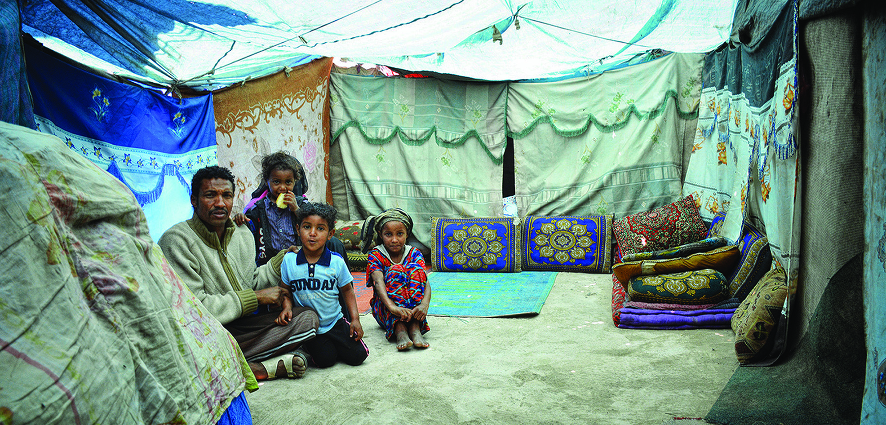 An internally displaced family in a camp in Hudaydah